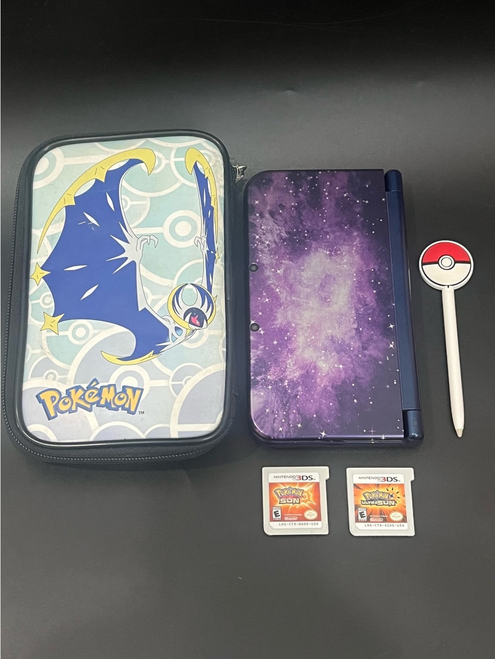 Nintendo 3DS XL Galaxy Edition Handheld System w/ Pokémon Sun Cart Games - Works
